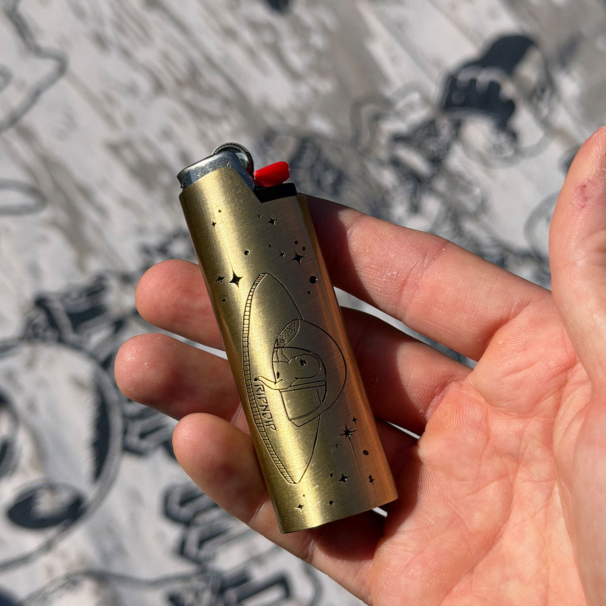 RIPNDIP Same Shit Different Day Lighter Cover (Gold)